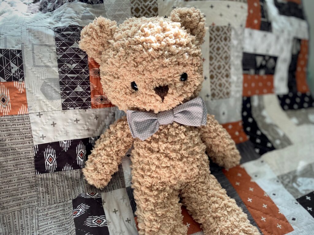 crochet teddy bear with baby quilt