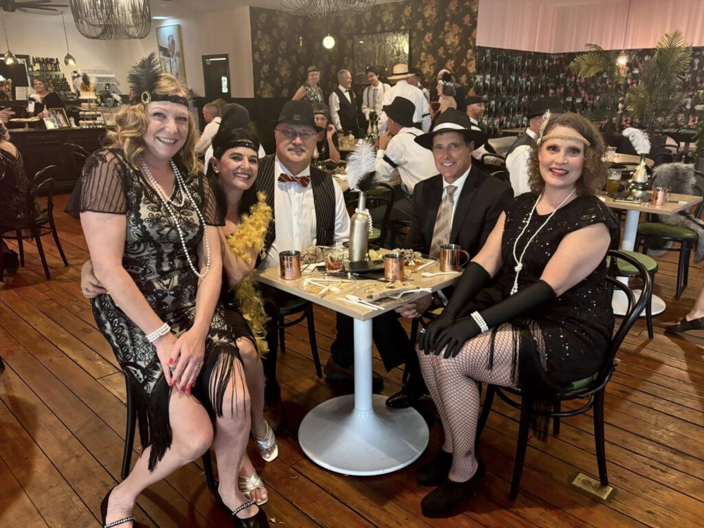 good looking friends who got into the spirit of the speakeasy party